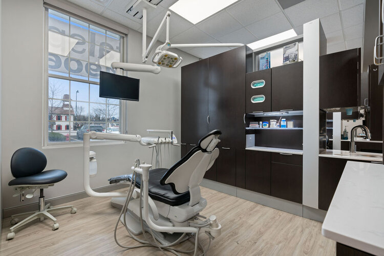 Modern dental operatory with chair and equipment